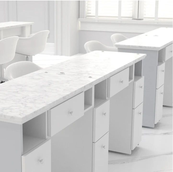 Modern manicure table with marble surface.